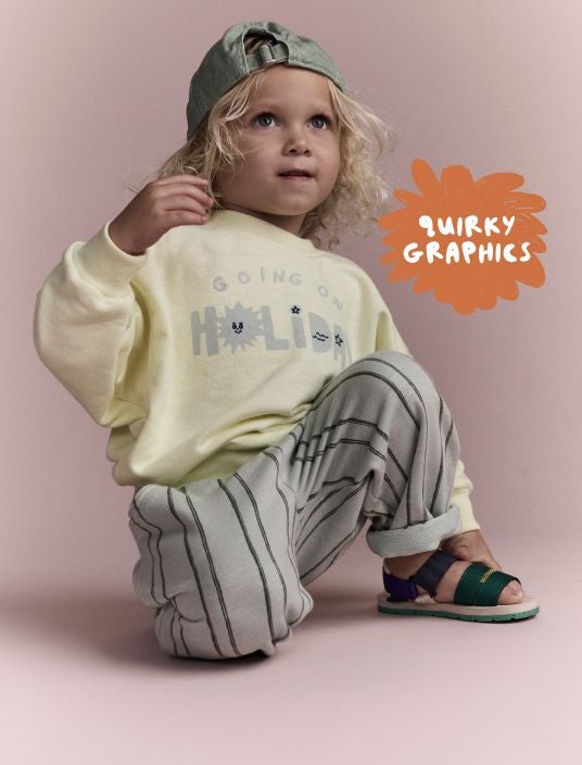 Toddler boy in sweatshirt and pants