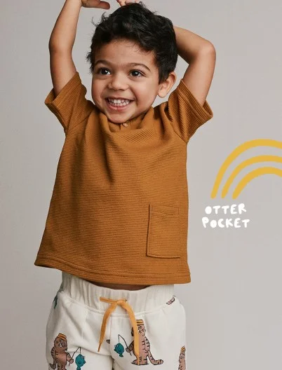 toddler boy in tee and graphic shorts