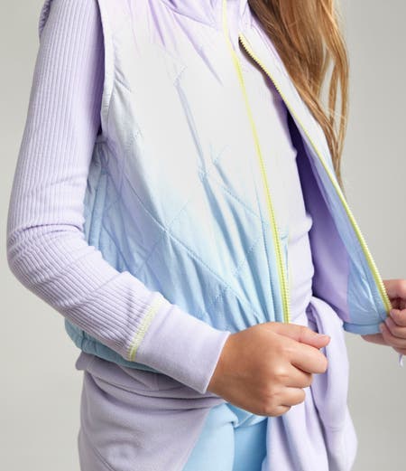 girl wearing vest