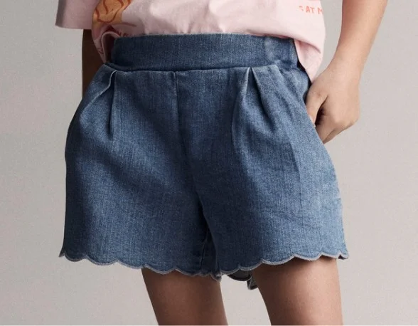 toddler girl in shorts