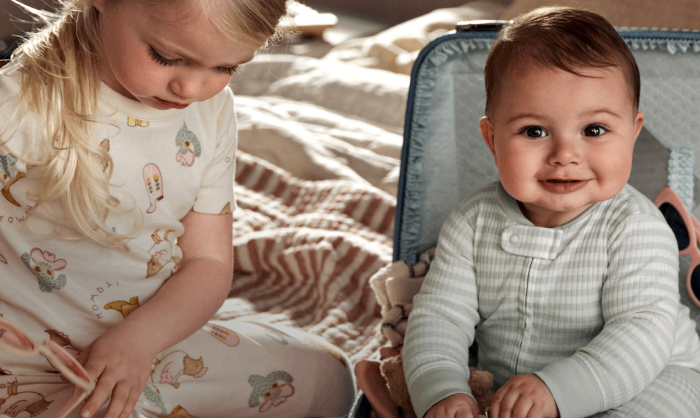 girl and baby in pajamas