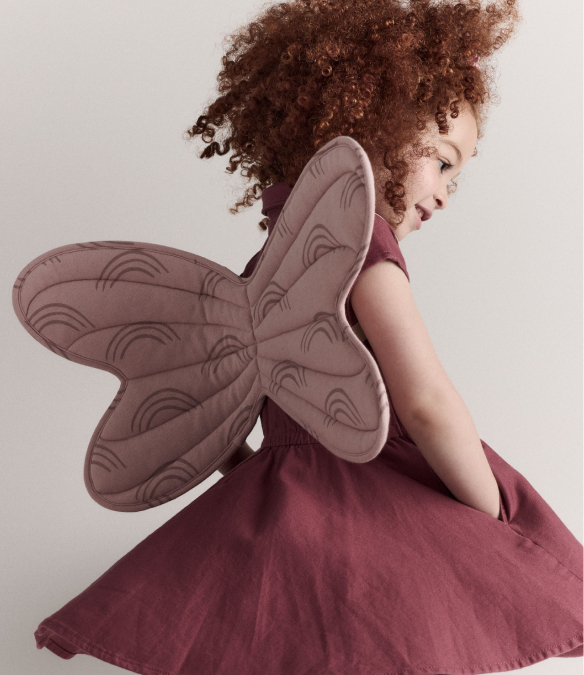 girl wearing wings