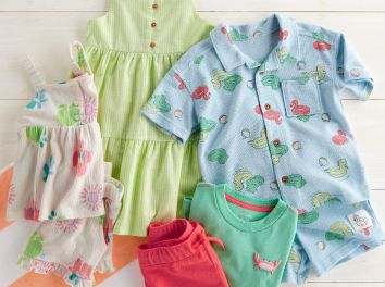 a laydown of colorful summer staples clothing