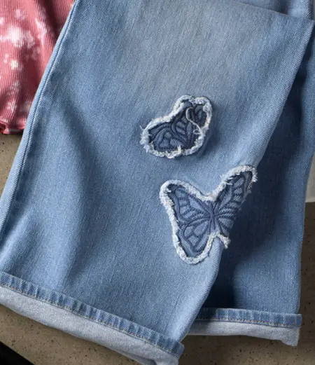 jeans with butterfly detail