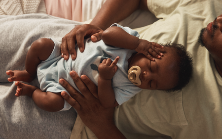 Sleeping baby with a pacifier