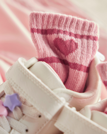 sock with heart inside of a shoe