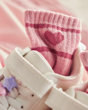 sock with heart inside of a shoe