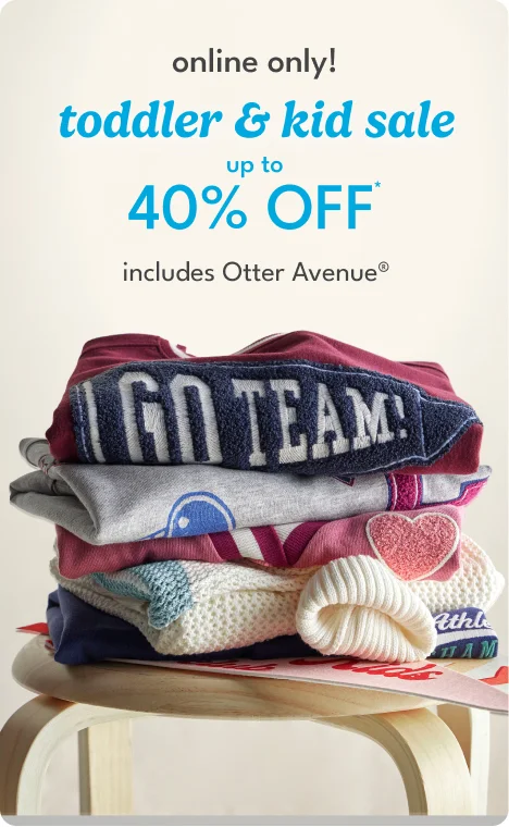 Pile of toddler and kid clothes with 40% off sale