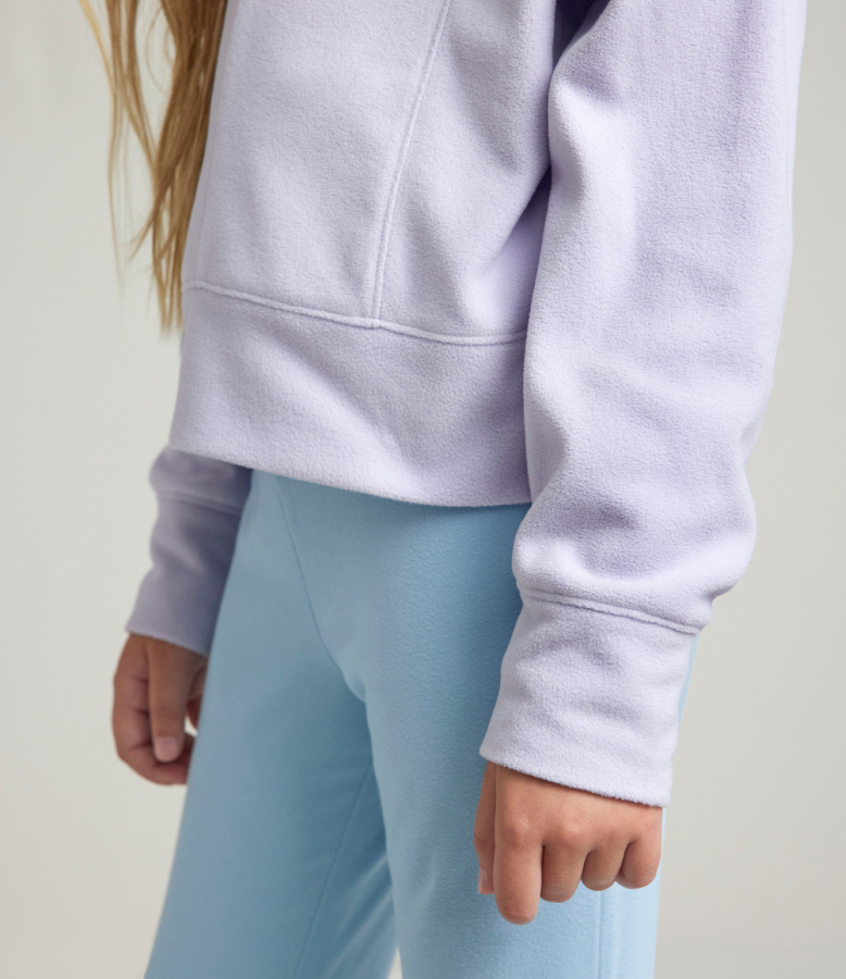 girl wearing purple pullover