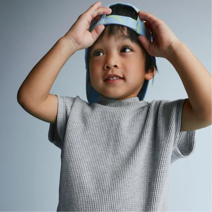 toddler boy in backwards cap