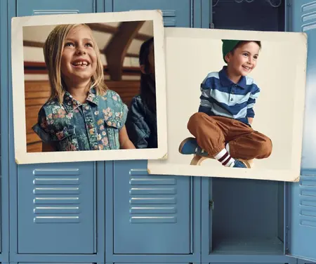 school boy wearing varsity oshkosh b'gosh jacket, polo, and cap