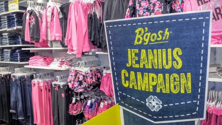 B'gosh Jeanius Campaign sign in an OshKosh store, 2014