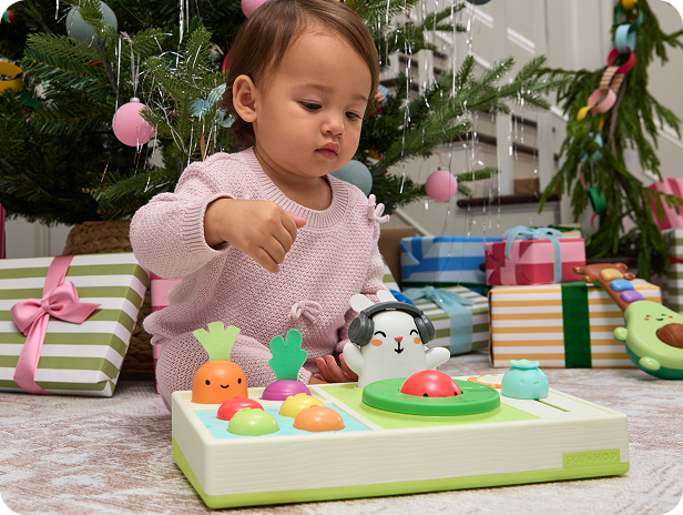Baby playing with DJ set