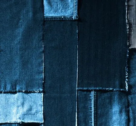background made up of denim swatches in varying tones