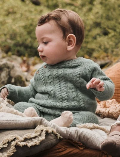 baby boy in knit sweater