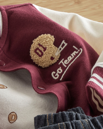 detail of helmet embroidery on jacket