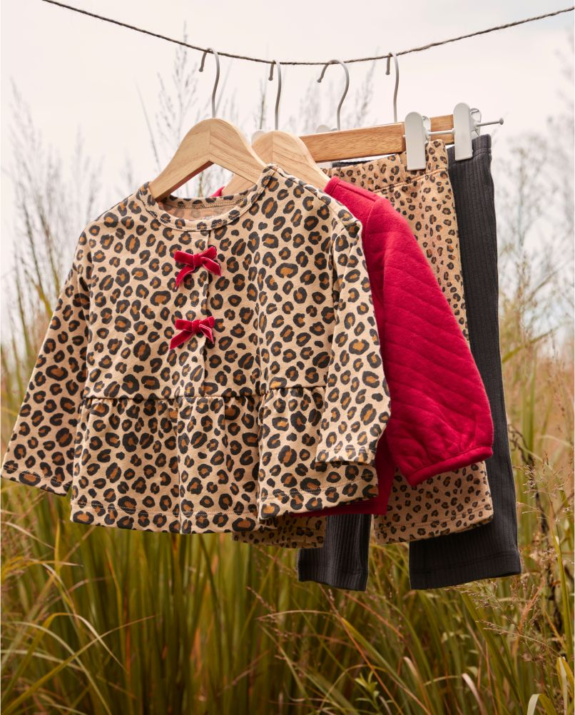 Leopard clothes on hangers