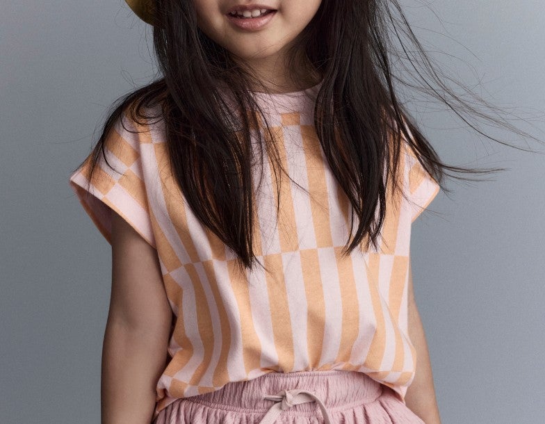 girl wearing pink and orange shirt
