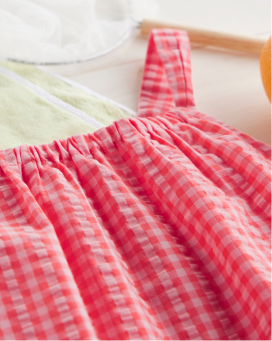 a detail shot of a plaid top