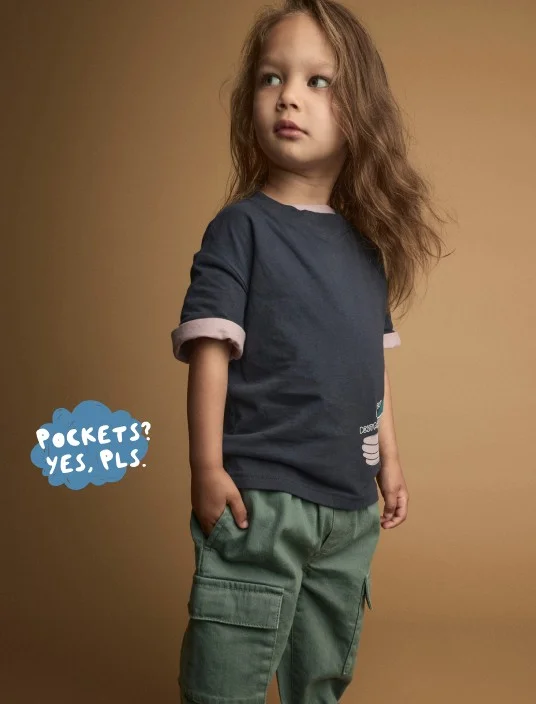 toddler boy in tee