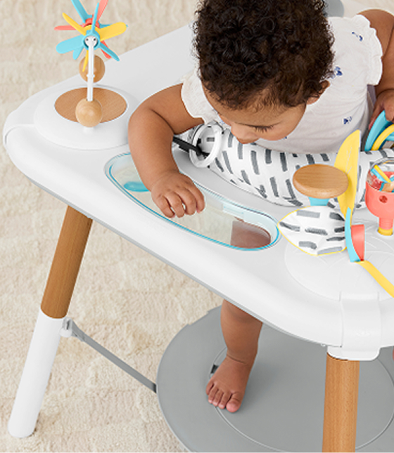 Baby in activity center