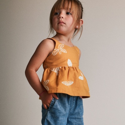 girl in green fashion top