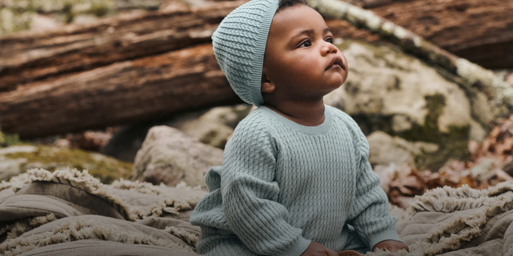 baby in sweater set