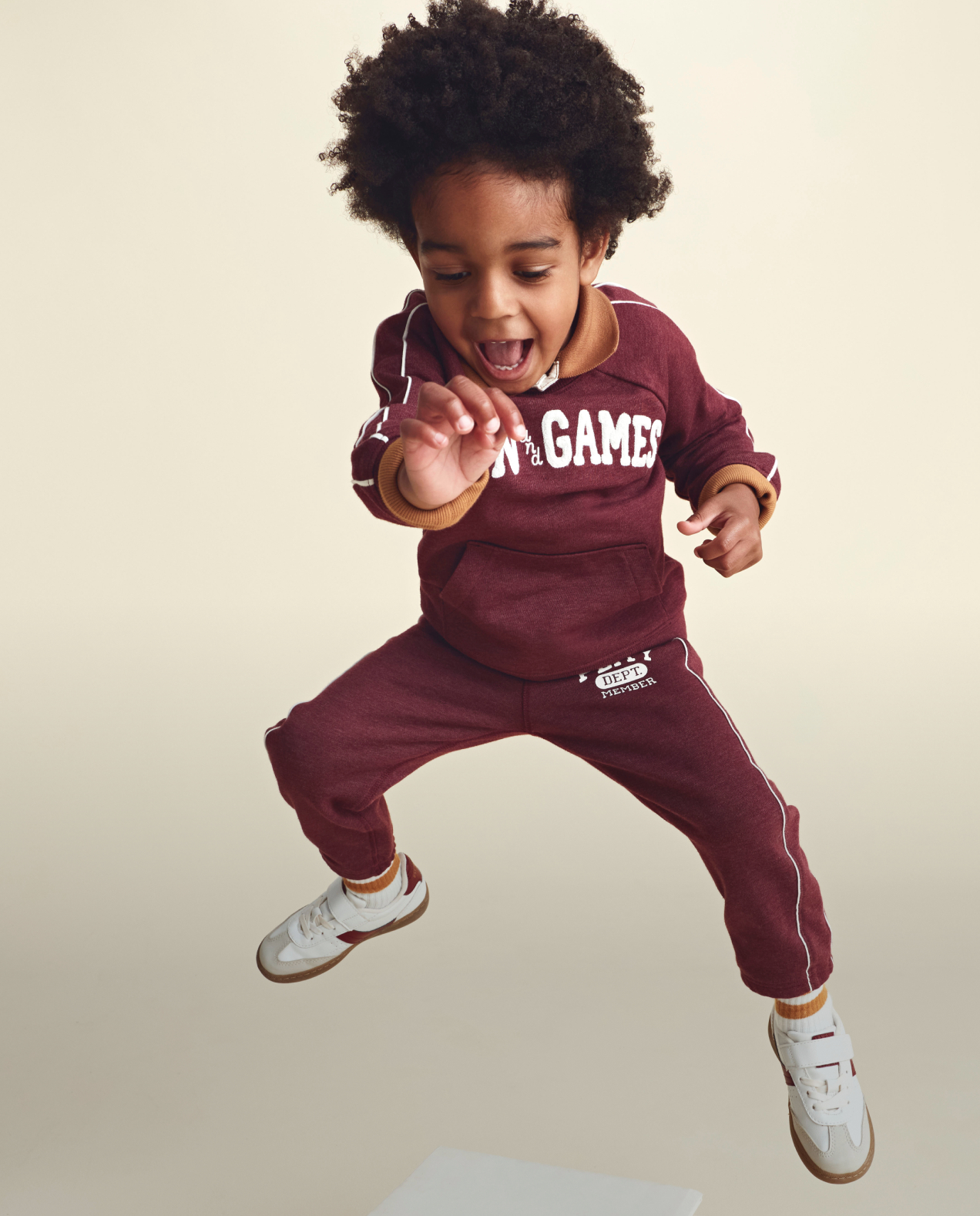 kid in playful prep outfit