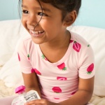 Girl in strawberry pajama