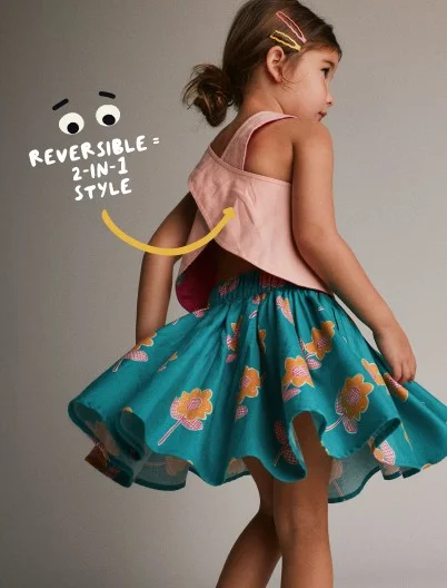 toddler girl in tank and floral, flowy skirt