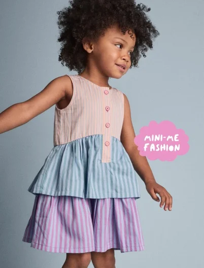 toddler girl in colorful dress
