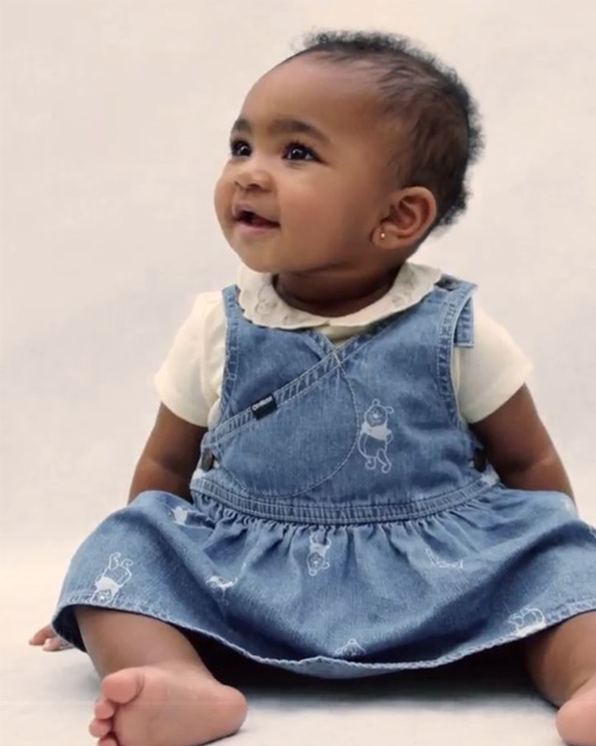 Product video 1 of Baby Girl Disney© Winnie the Pooh Denim Wrap Skirtall - Medium Wash