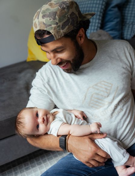 bubba wallace with baby in arms