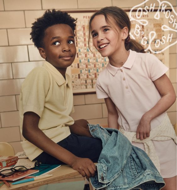 two kids in uniforms