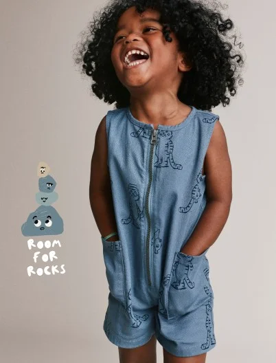 toddler boy in graphic romper