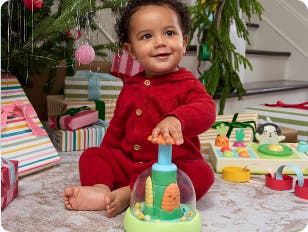 Baby with corn popper