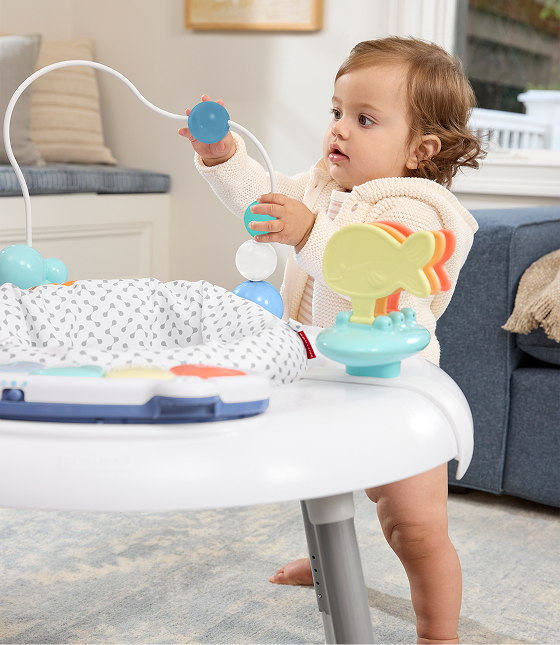 Baby in activity center