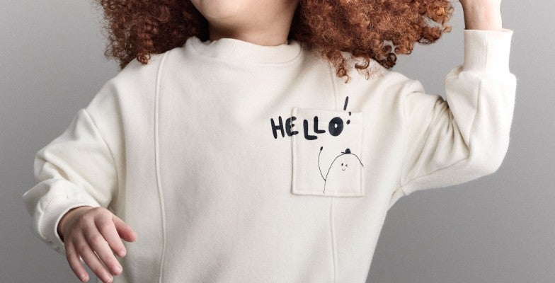 girl wearing sweatshirt