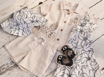 a laydown of neutral colored clothing