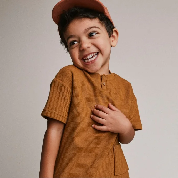 toddler boy in textured tee