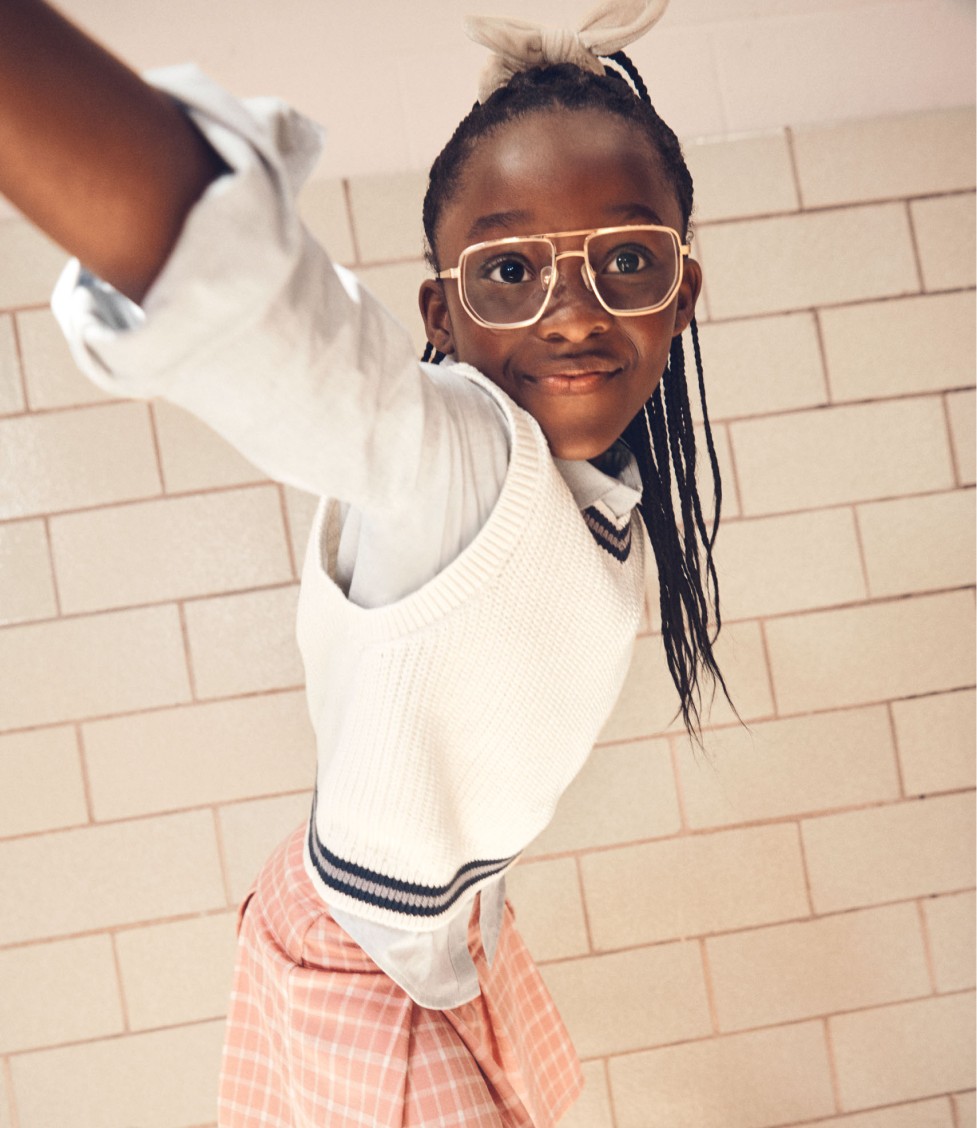 girl in school building taking selfie