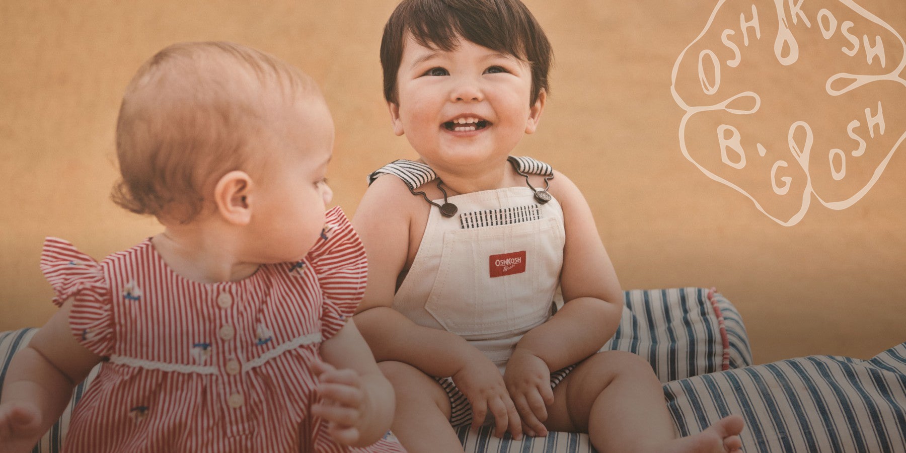 baby in americana overalls